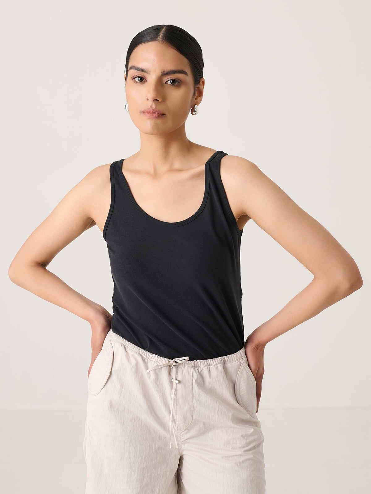 The Better Tank in Black, worn by a model