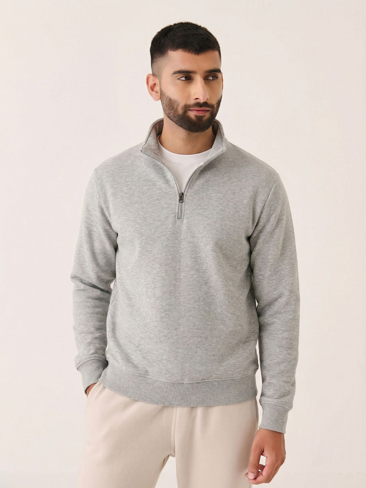 Quarter Zip Sweatshirt - Fleece Lined in Grey, worn by a model