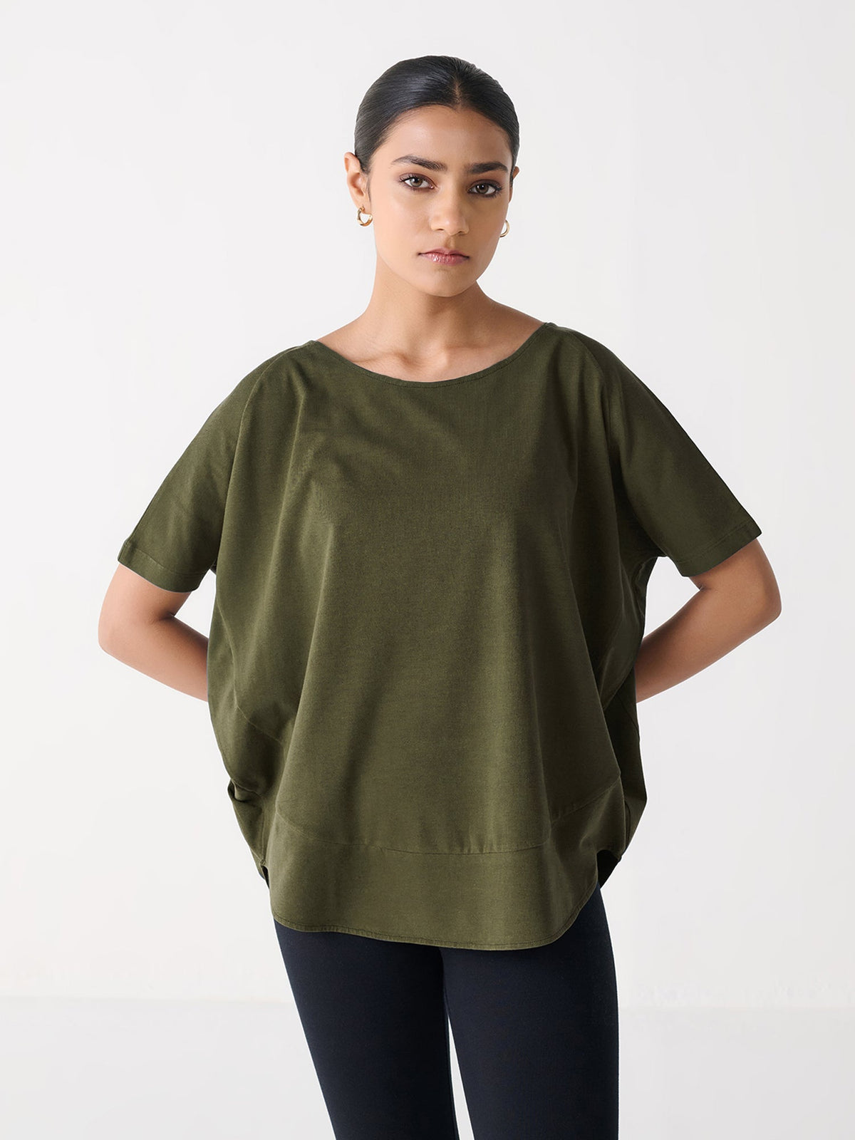 Flowy Fit Top in Olive, worn by a model