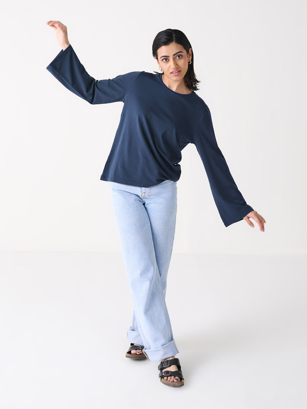 Bell Sleeve Top in Navy - front view on model