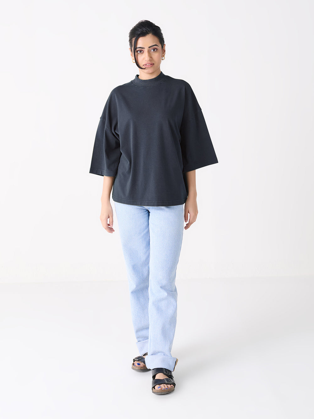 Oversized High Neck in Navy - front view on model