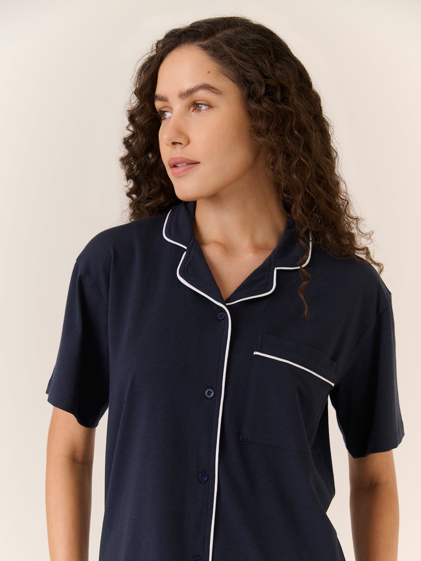 Woman wearing Better Basics navy sleepwear