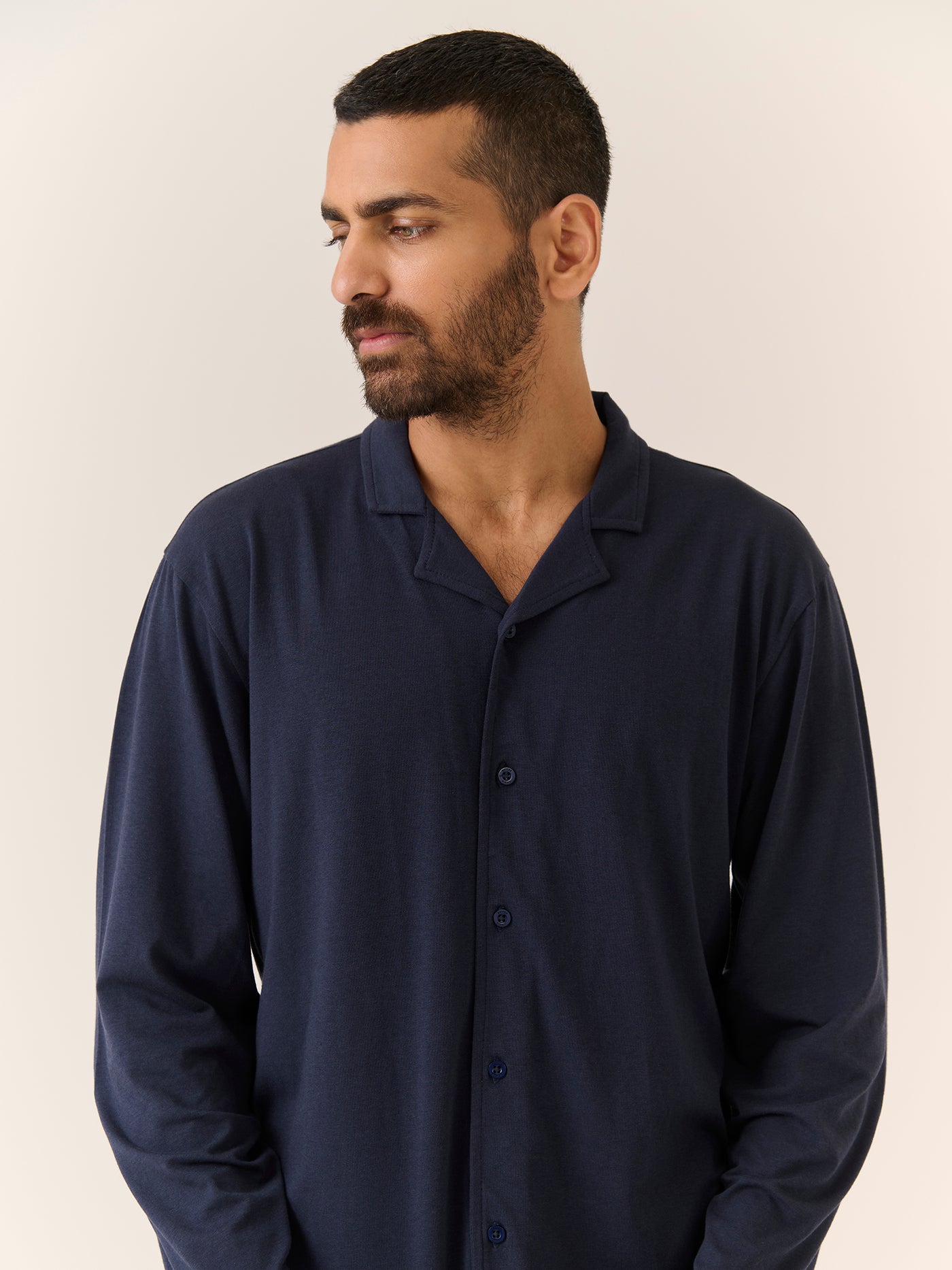 Man wearing Better Basics navy sleepwear