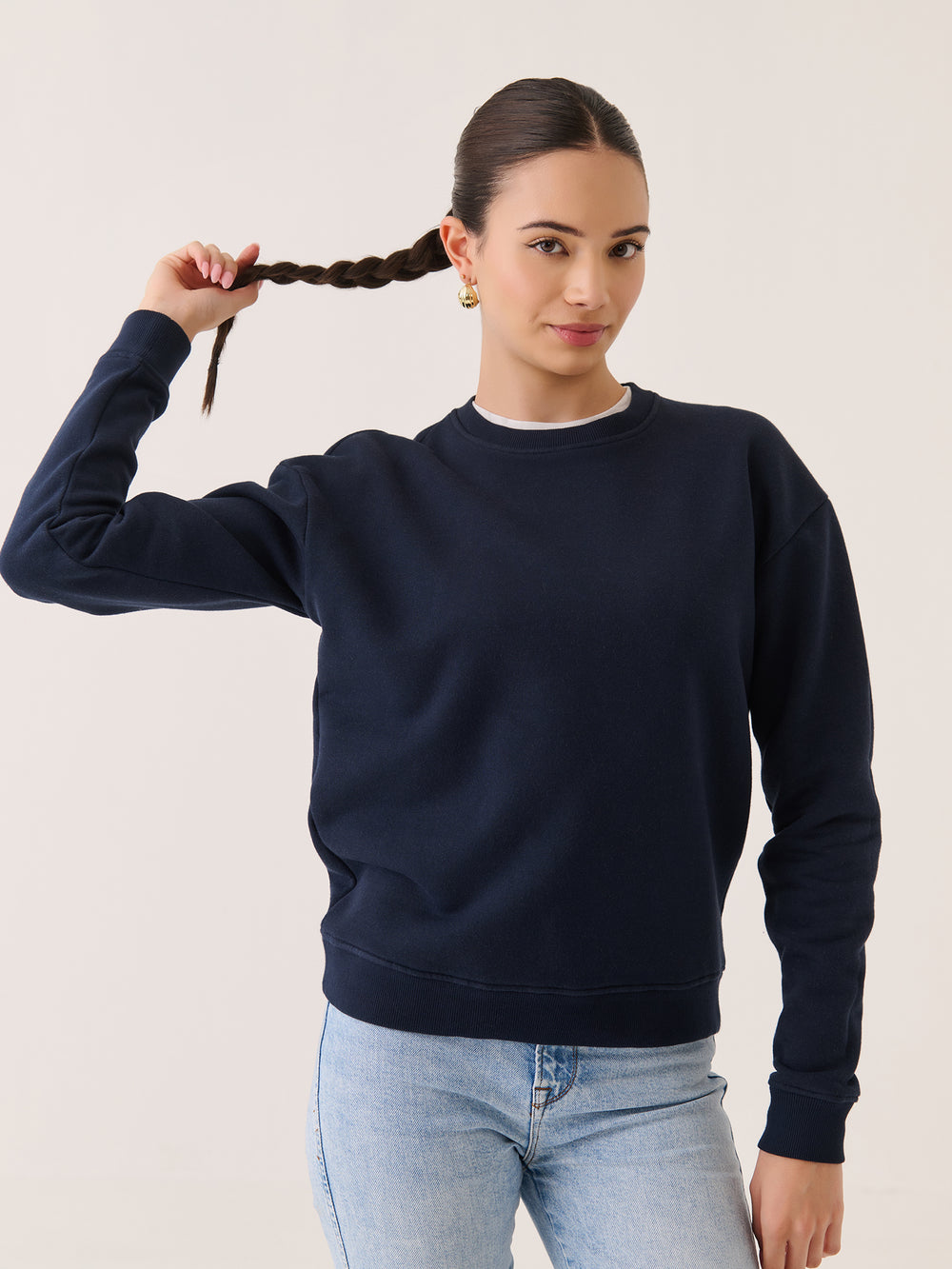 Crew Neck Sweatshirt in Navy - front view on model