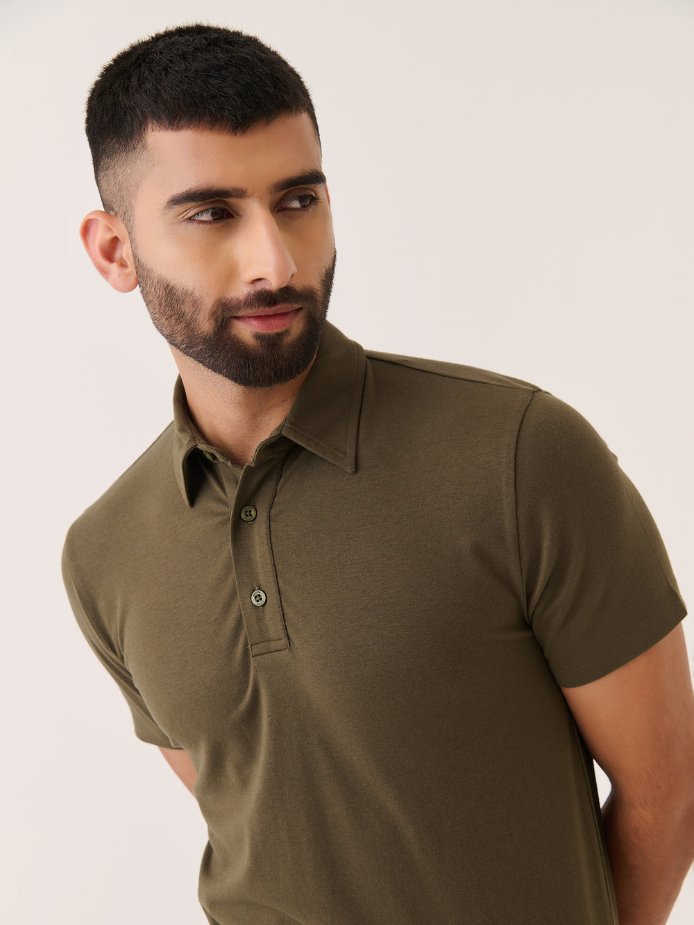 Short Sleeve Polo in Olive - front view on model