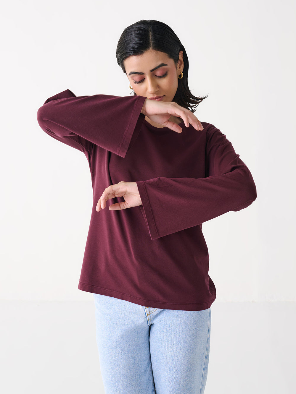 Bell Sleeve Top in Wine - front view on model