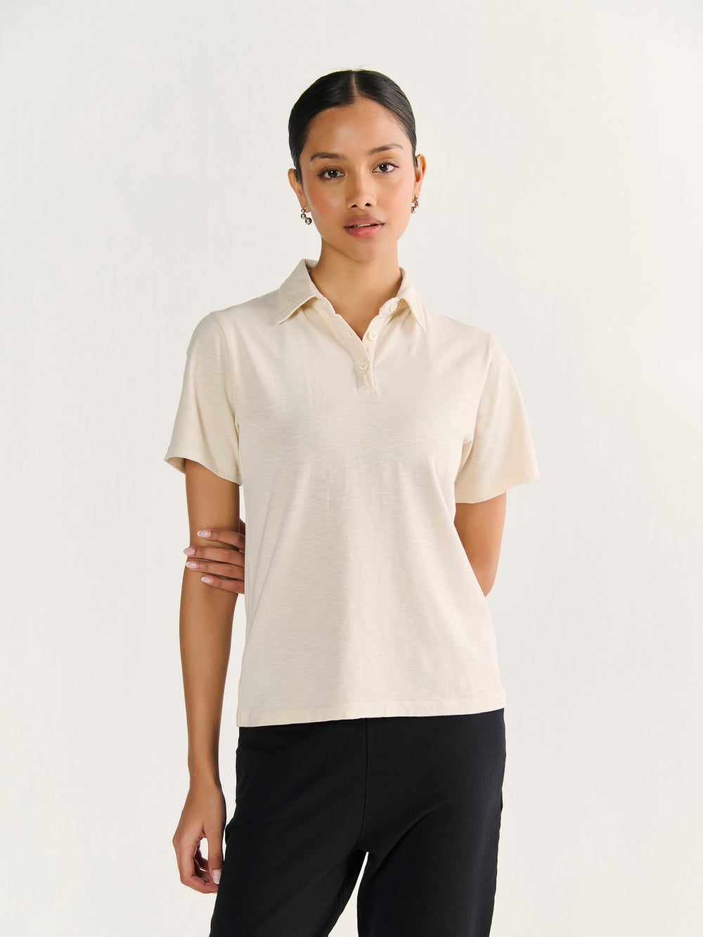 Textured Slub Short Sleeve Polo in Beige - front view on model