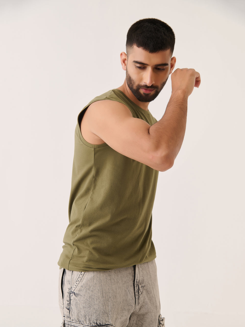 Sleeveless Tee in Olive - front view on model