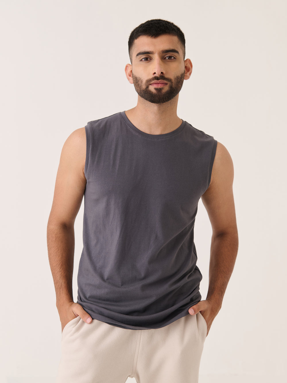 Sleeveless Tee in Charcoal - front view on model