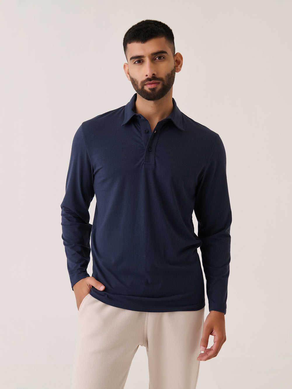 Long Sleeve Polo in Navy - front view on model