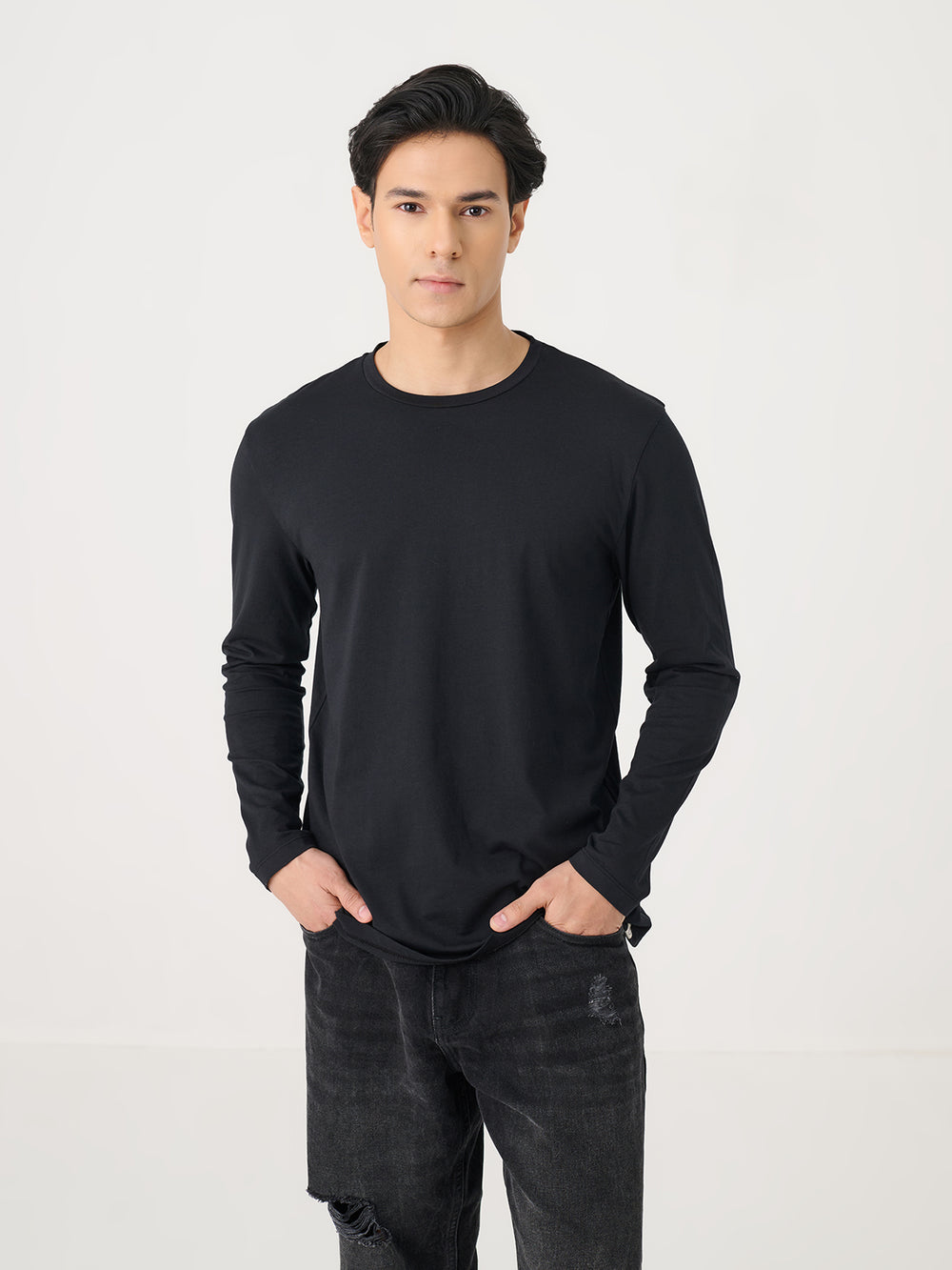 Long Sleeve Tee in Black - front view on model