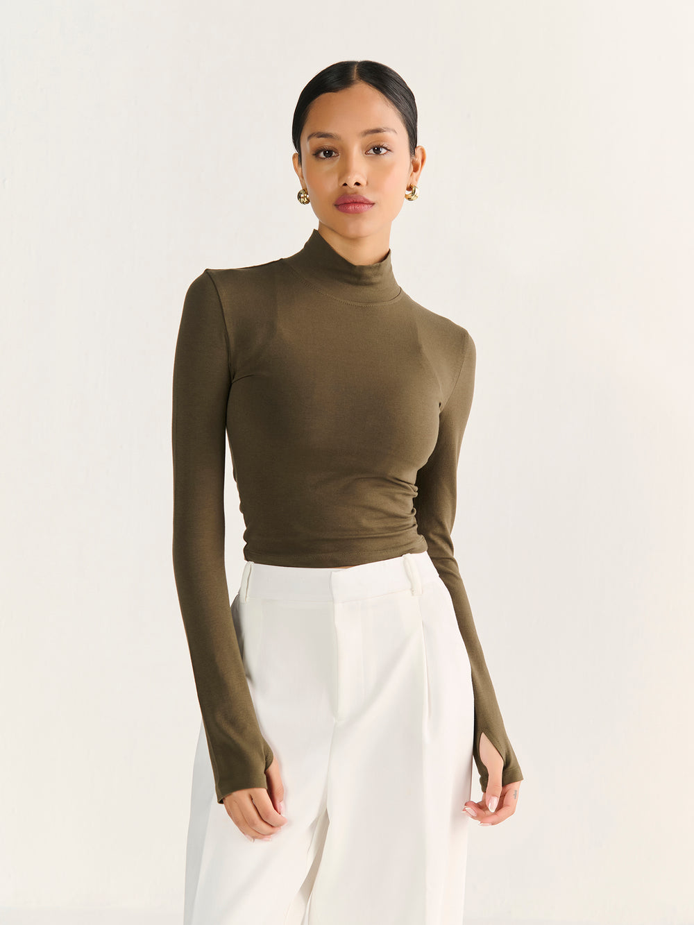 High Neck Long Sleeve Crop in Olive - front view on model