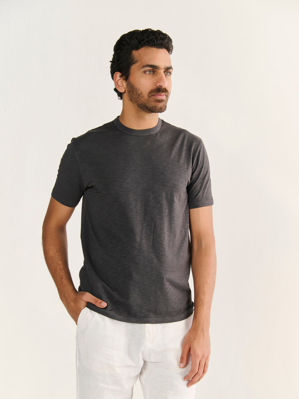 Textured Slub Short Sleeve Tee in Charcoal - front view on model