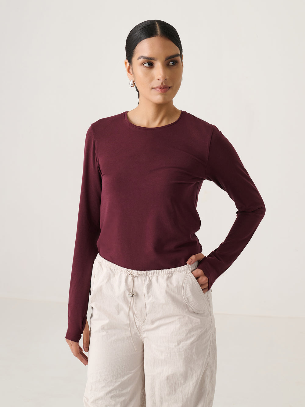 Slim Fit Long Sleeve Top in Wine - front view on model