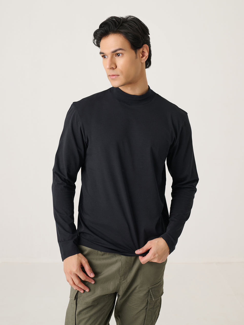 Mock Neck in Black - front view on model