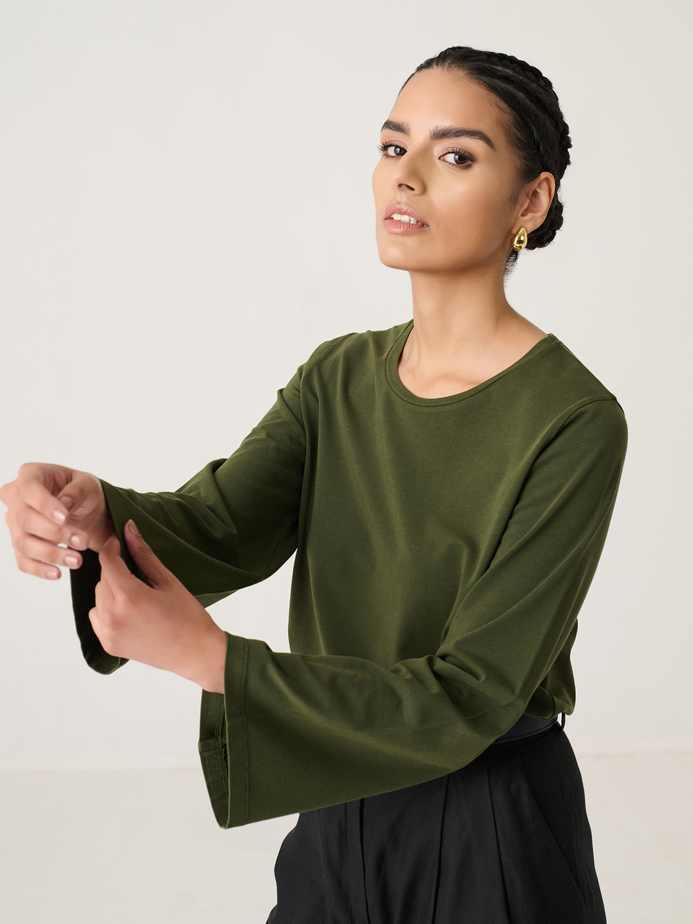 Bell Sleeve Top in Olive - front view on model