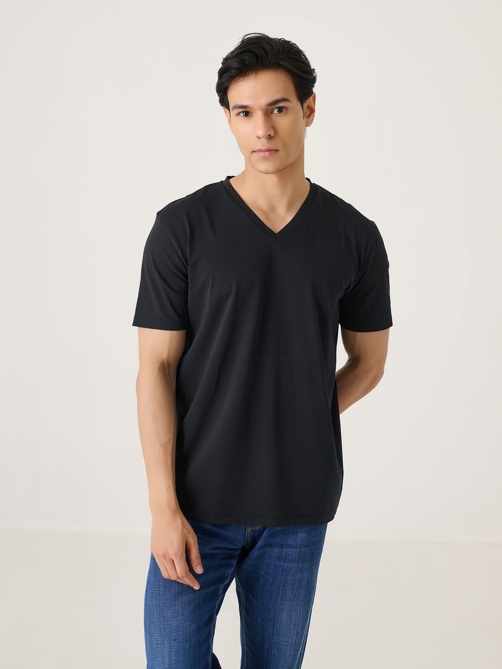 V Neck Short Sleeve in Black - front view on model