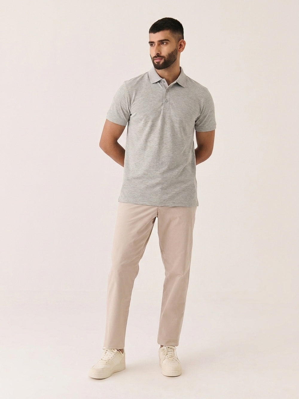 Short Sleeve Polo in Grey Melange - front view on model