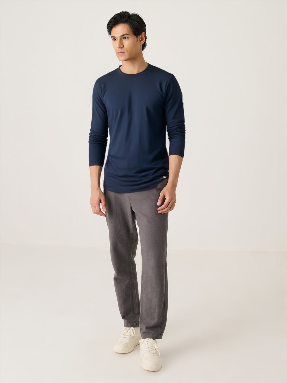 Long Sleeve Tee in Navy - front view on model