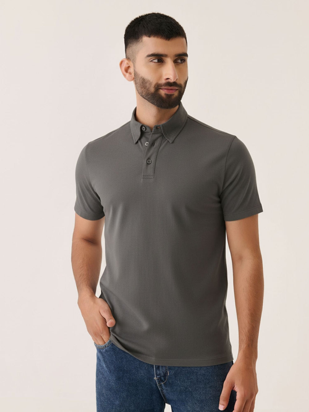 Short Sleeve Polo in Charcoal - front view on model