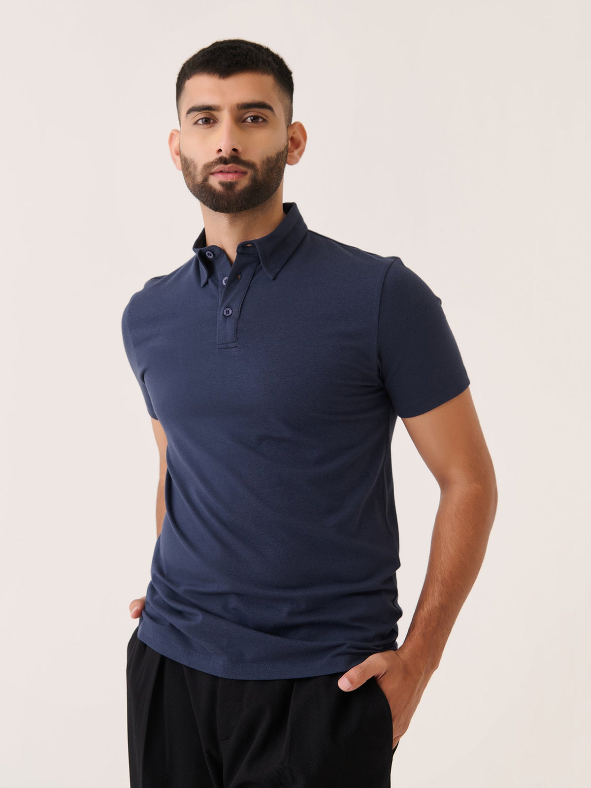 Short Sleeve Polo - Slim Fit Stretch in Navy - front view on model