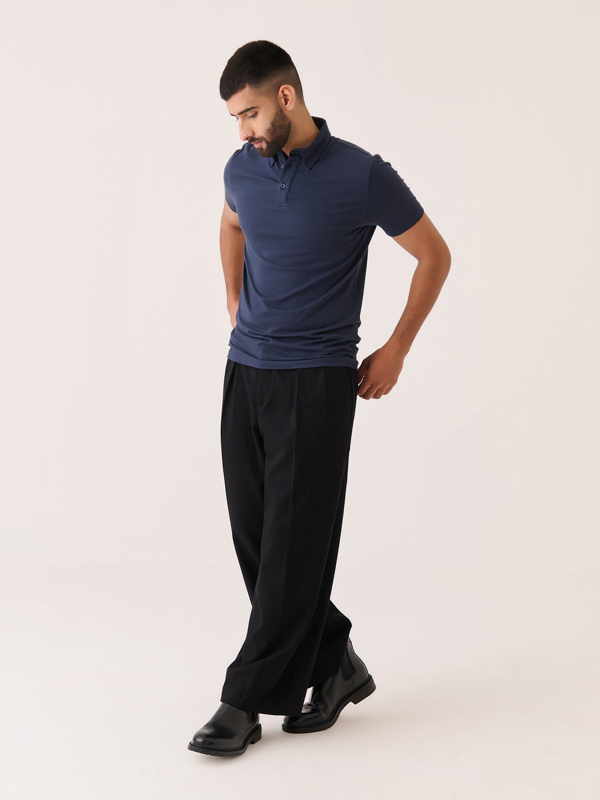 Short Sleeve Polo - Slim Fit Stretch in Navy - back view on model