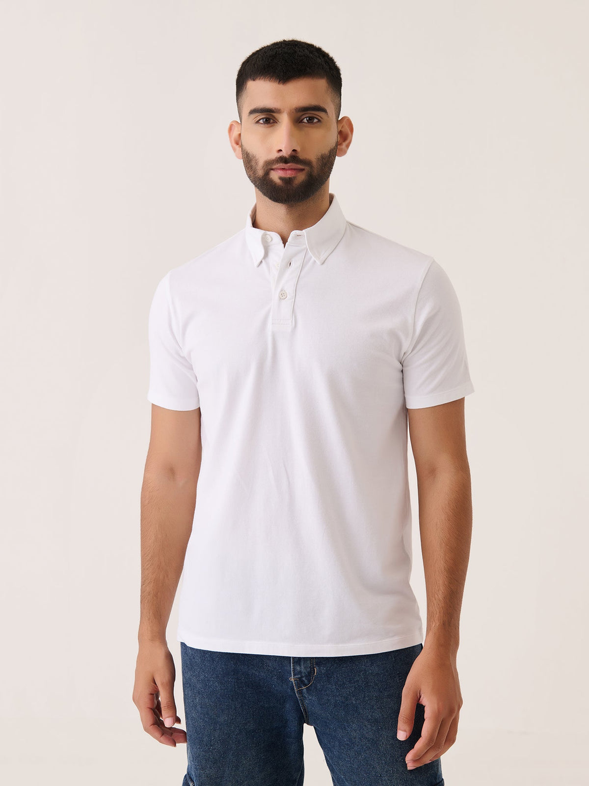 Short Sleeve Polo in White - front view on model