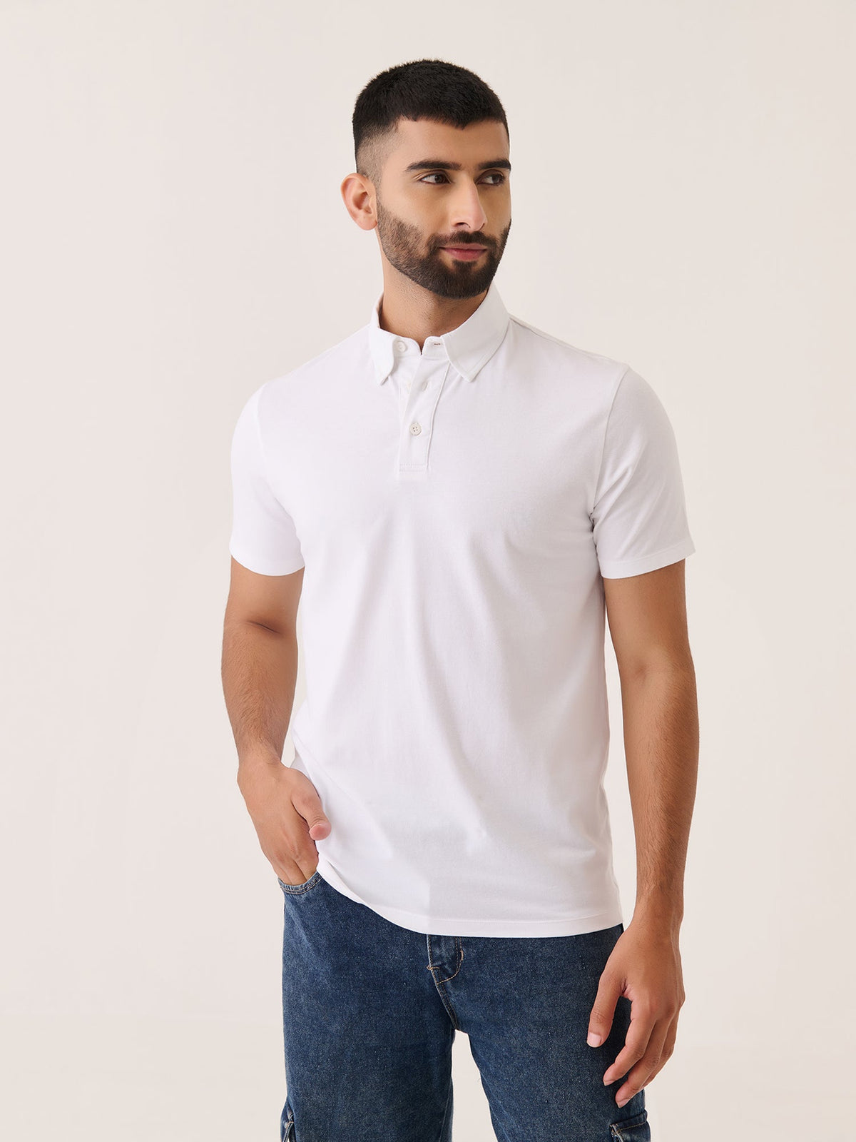 Short Sleeve Polo in White - back view on model